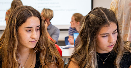 Two students in classroom