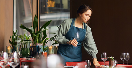 Hospitality student raising hand