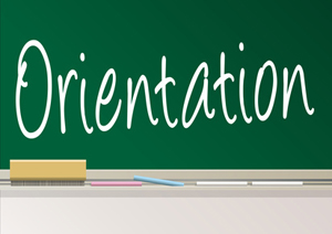 Green chalkboard with the words Orientation written
