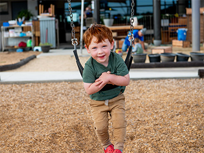 child on swing