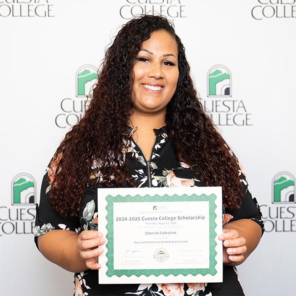 person holding certificate