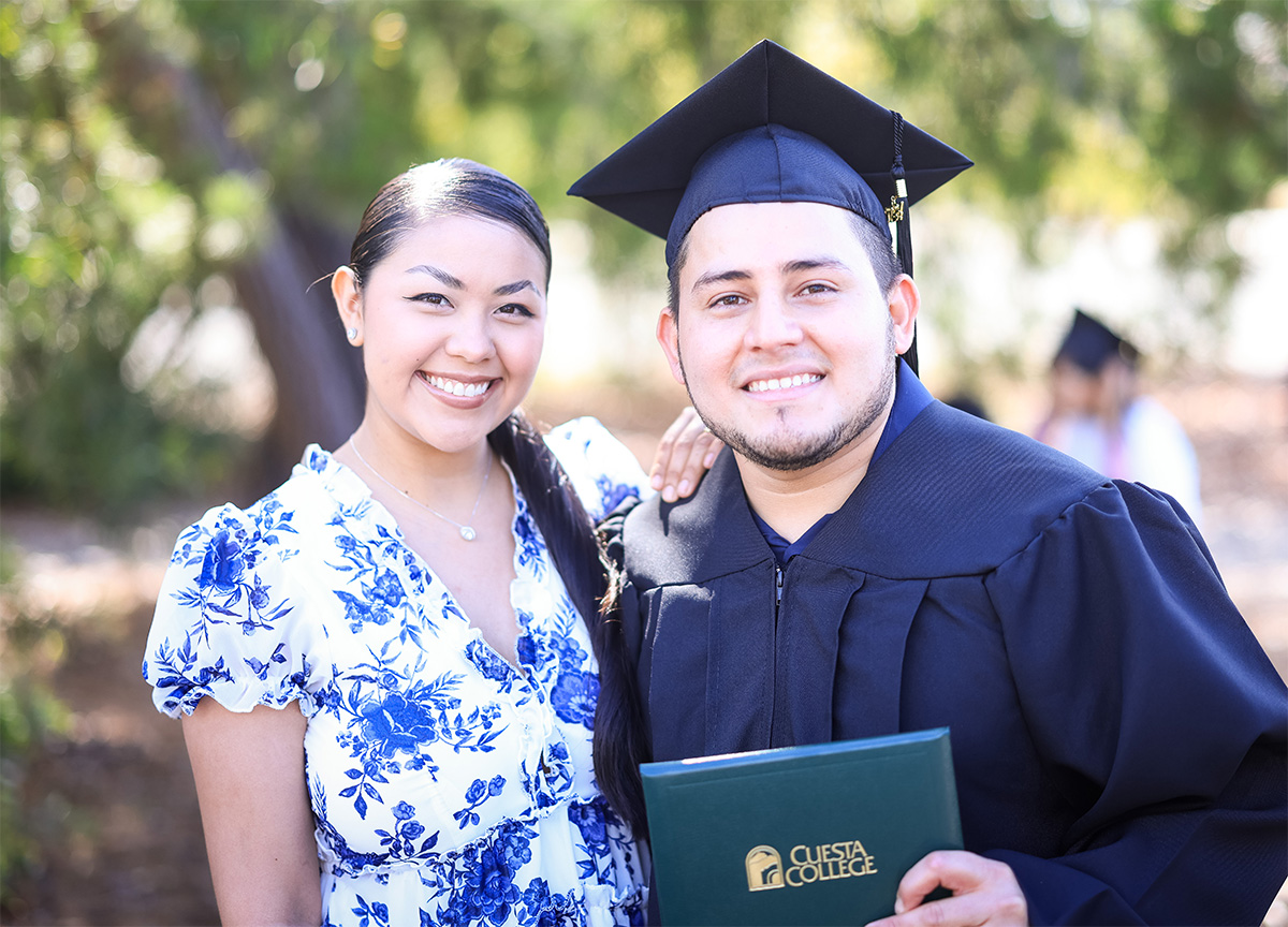 commencement couple with diploma